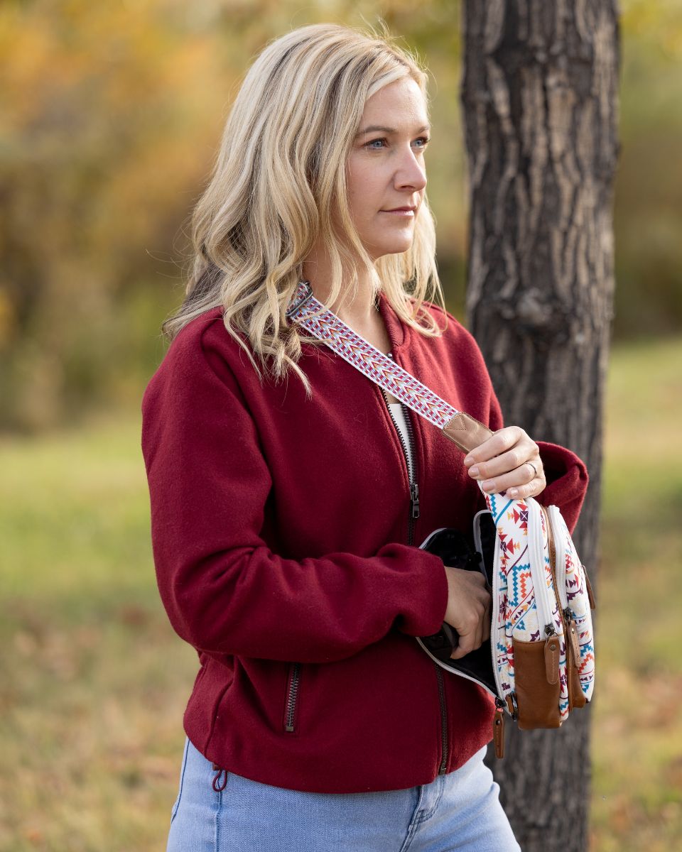 Female with concealed bag, Indie sling crossbody with organization for cards, keys, and defense tools